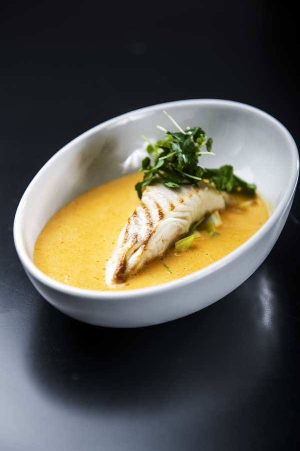 Pan-fried Sterling® halibut served in red curry soup